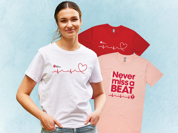Woman wearing a white t-shirt with a red and pink t-shirt design on a light blue background