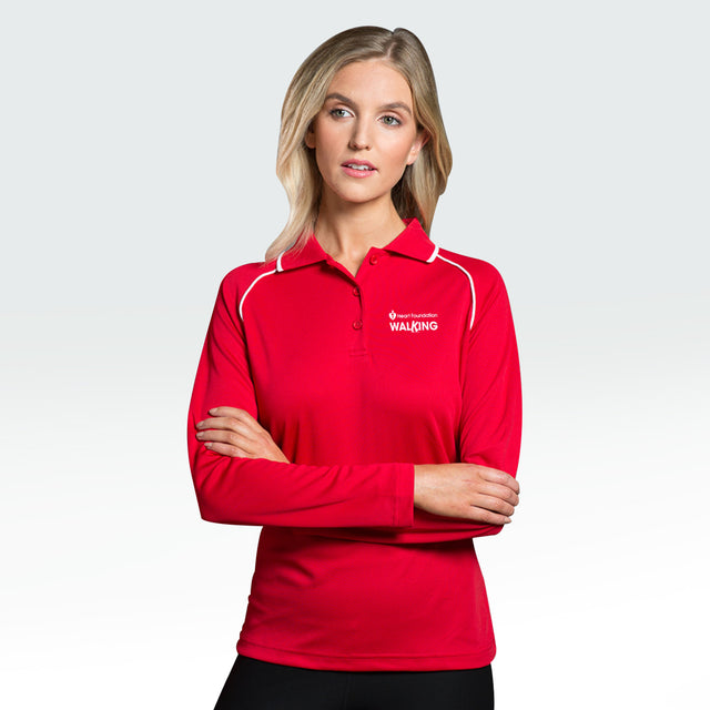 Woman modelling the Heart Foundation Walking's red long sleeved polo shirt, showing white collar accents on raglan sleeve seam and collar.