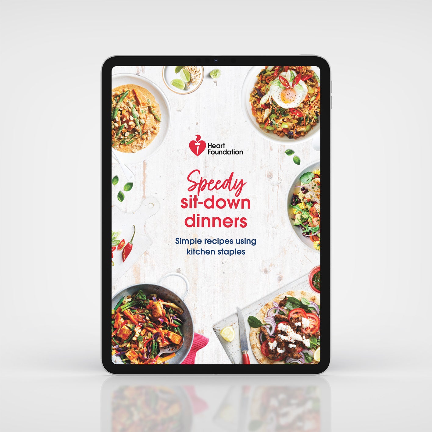 Tablet displaying a Heart Foundation recipe book with images of meals on a white background