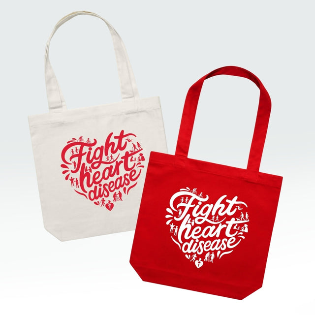 Two canvas tote bags on a light gray background, one in off-white with a red printed design and one in red with a white printed design. Both bags feature the text 'Fight heart disease' inside a heart outline with small medical icons.