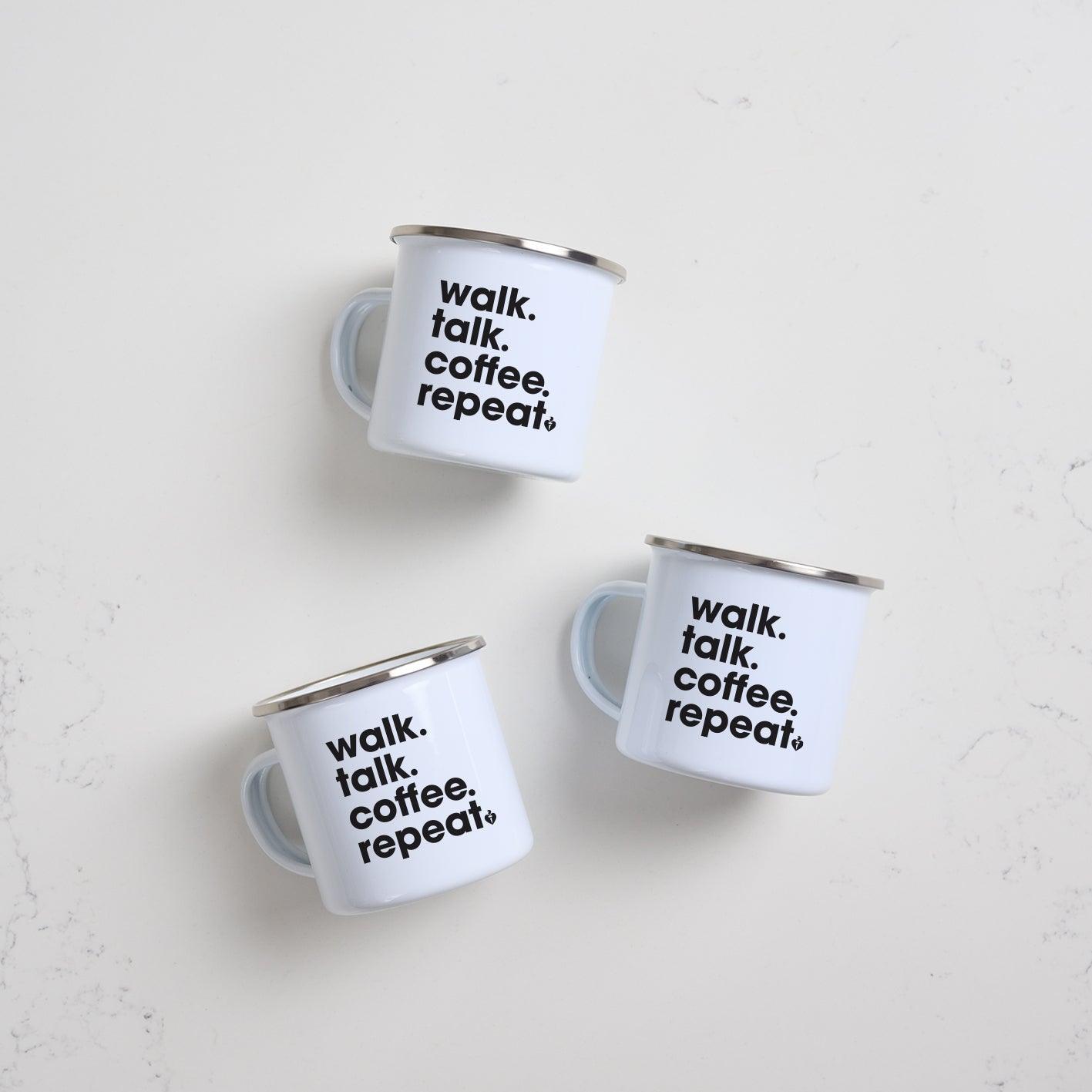 Heart Foundation white enamel mug with silver rim and Walk.Talk.Coffee.Repeat. slogan in black print