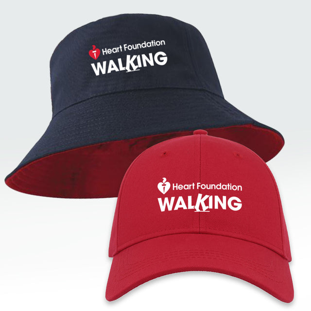 Navy bucket hat and red cap with Heart Foundation Walking logo featured on a light gray background