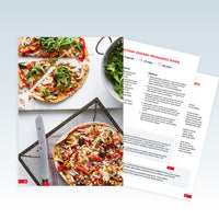A recipe page for 'fryer chicken shawms bowls' is shown overlapped by a styled food photo of prepared flatbread pizzas on a light gray background.