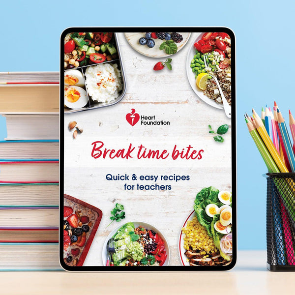 A tablet with the cover of Heart Foundation's Break time bites recipe e-book, which includes quick and easy recipes for teachers.