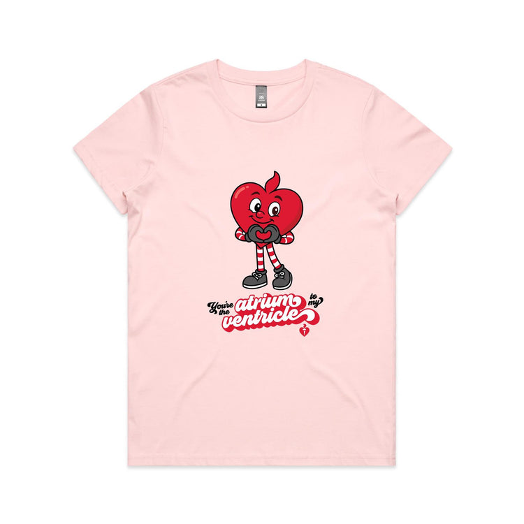 Pale pink t-shirt with a red cartoon character and text on a white background