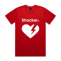 A red short-sleeve crewneck t-shirt with a white graphic on the front featuring the word 'Shocker' and a broken heart with a lightning bolt inside, shown against a light gray gradient 
