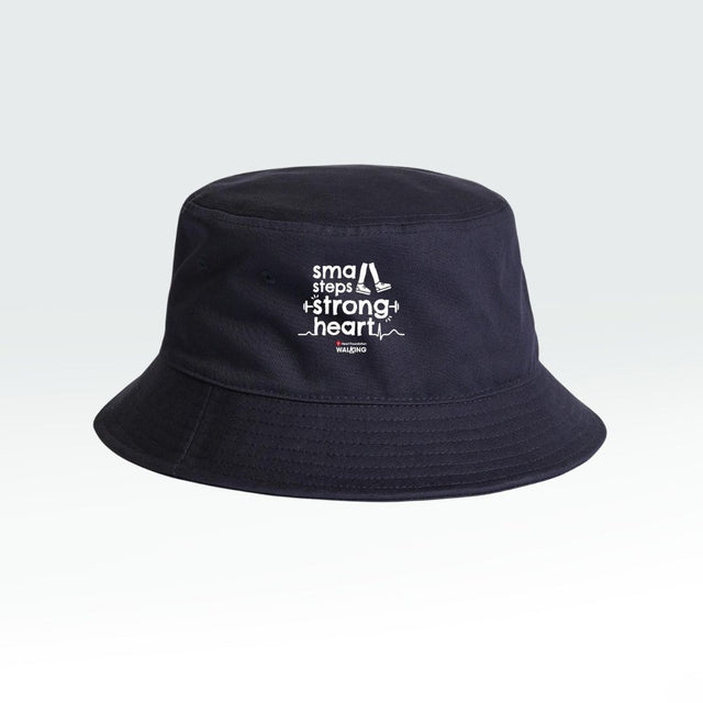 Navy bucket hat with the slogan Small steps strong heart featured on gradient grey background