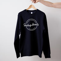 Navy unisex Heart Foundation sweatshirt featuring Saving hearts design in white print, displayed on hanger.