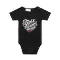 Black baby onesie with a white heart-shaped “Fight heart disease” design, featured on white background.