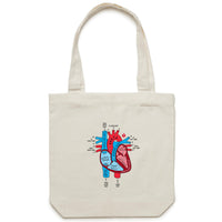 Cream canvas tote bag featuring an anatomical heart drawing shown on a white background.