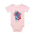 Pink infant onesie featuring an anatomical heart drawing, shown on a white background.