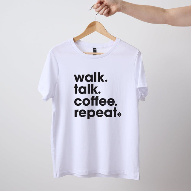 Women's short sleeve white Heart Foundation t-shirt displayed on hanger with Walk.Talk.Coffee.Repeat print to centre chest.