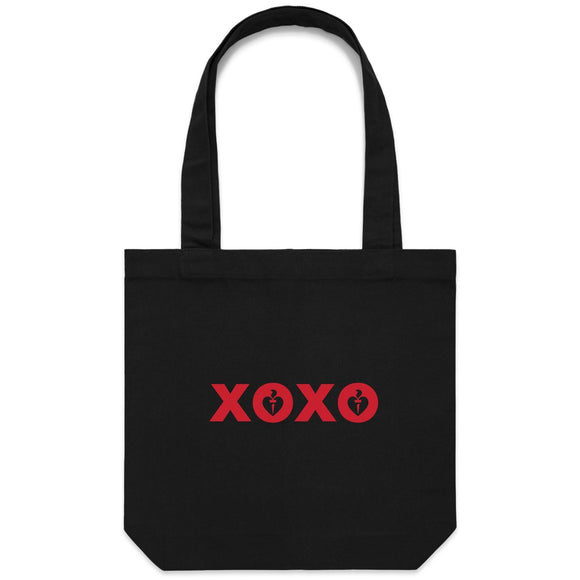 Heart Foundation black canvas tote bag with XOXO design in red print on the front.