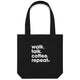 Heart Foundation black canvas tote bag with walk.talk.coffee.repeat. slogan in white print on the front.
